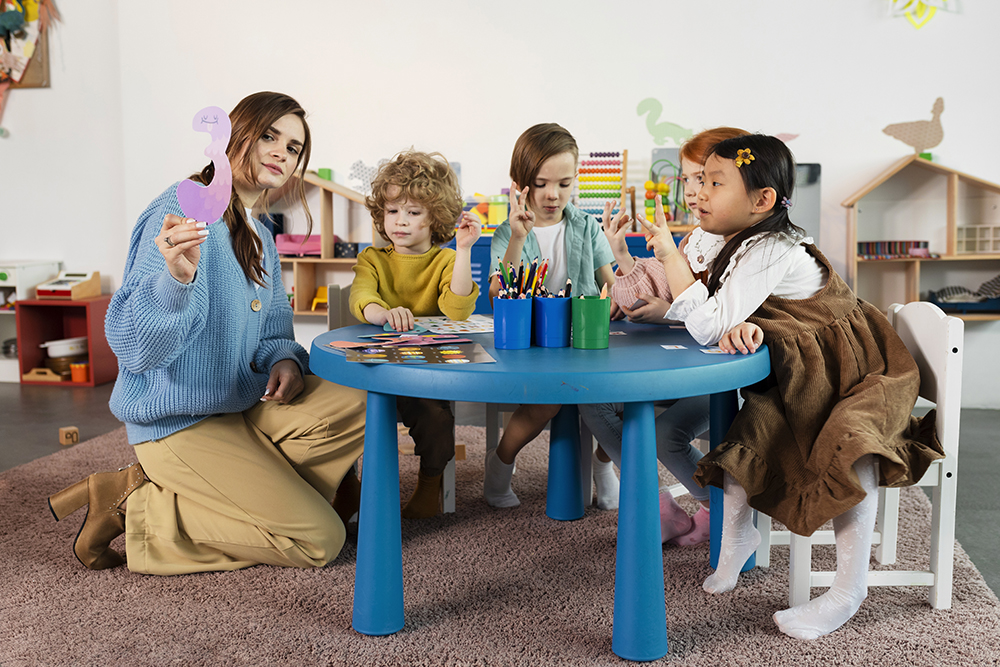 full shot kids sitting together table